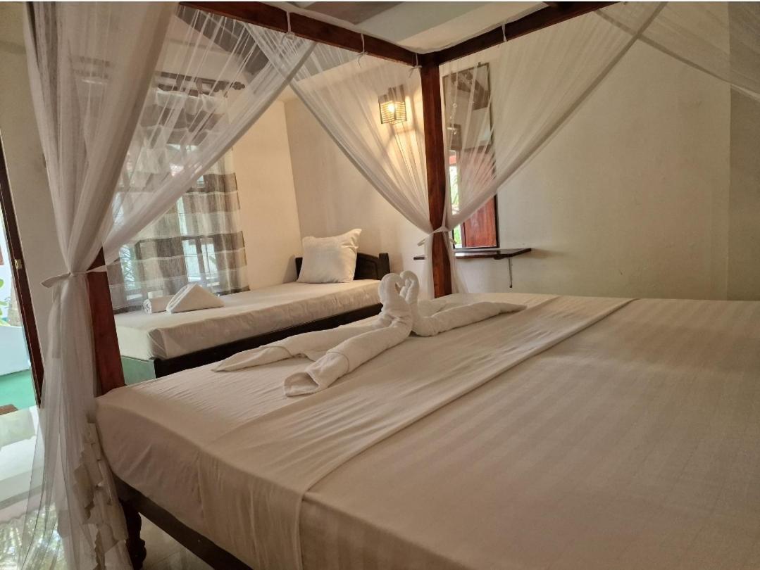 Panorama Beach Hotel แทนกาลเล ภายนอก รูปภาพ